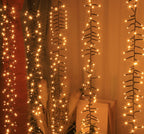 Cascade warm-white strands styled as a decorative hanging display