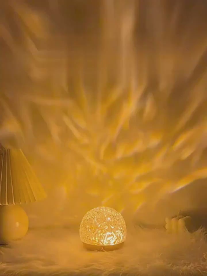 Ripple Glow crystal sphere on a bedside table with coloured ripple light — demonstration